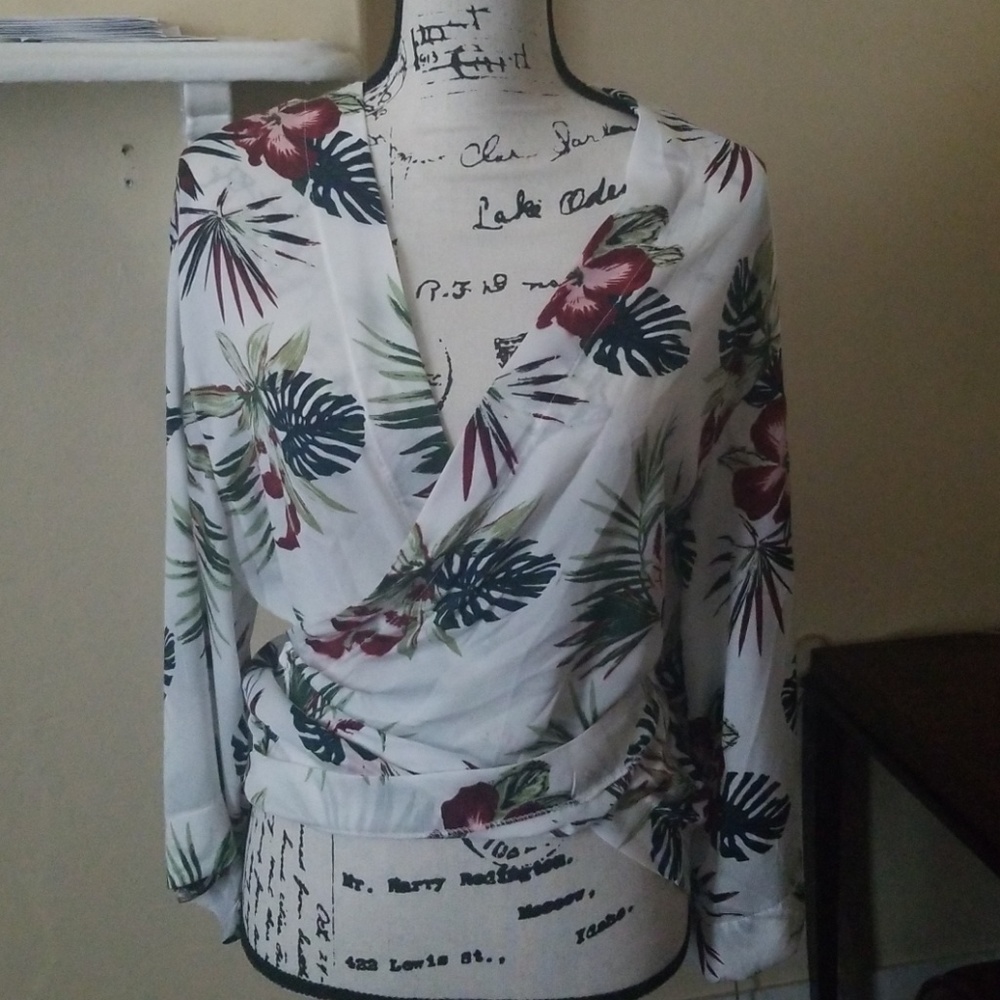 Cute  bell sleeve wrap top.
